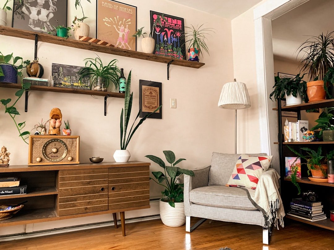 Small apartment living room with TV wall and floating shelves