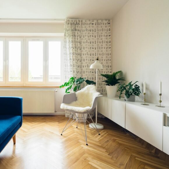 Cozy living room with comfortable sofa and warm ambient lighting