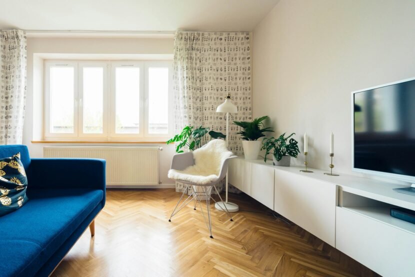 Cozy Living Room Ideas That Make You Never Want to Leave Cozy living room with comfortable sofa and warm ambient lighting