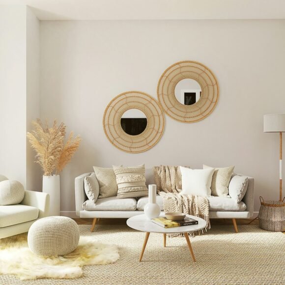 Small apartment living room with neutral sofa, rug and warm lamp lighting