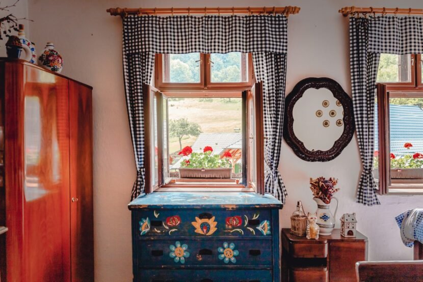 English Cottage Bedroom Ideas for a Modern Home Blue painted wooden dresser with a mirror in a cottage bedroom