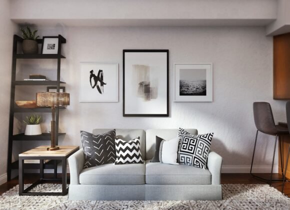 A stylish small living room with a compact sofa and well-organized furniture layout that maximizes space
