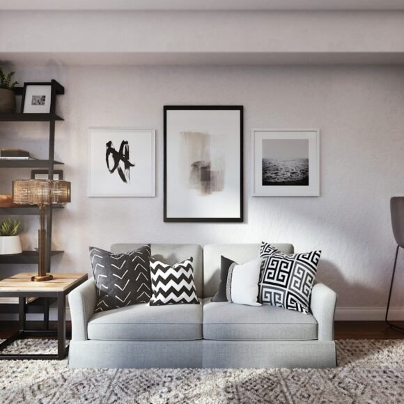 A stylish small living room with a compact sofa and well-organized furniture layout that maximizes space