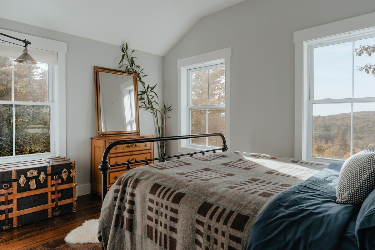 Bedroom in cream and warm neutral tones with layered texture