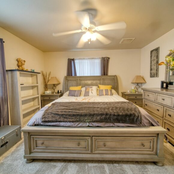 Bedroom Storage Ideas That Hide Clutter Beautifully Calm bedroom with dresser storage and mirror keeping surfaces clear of clutter