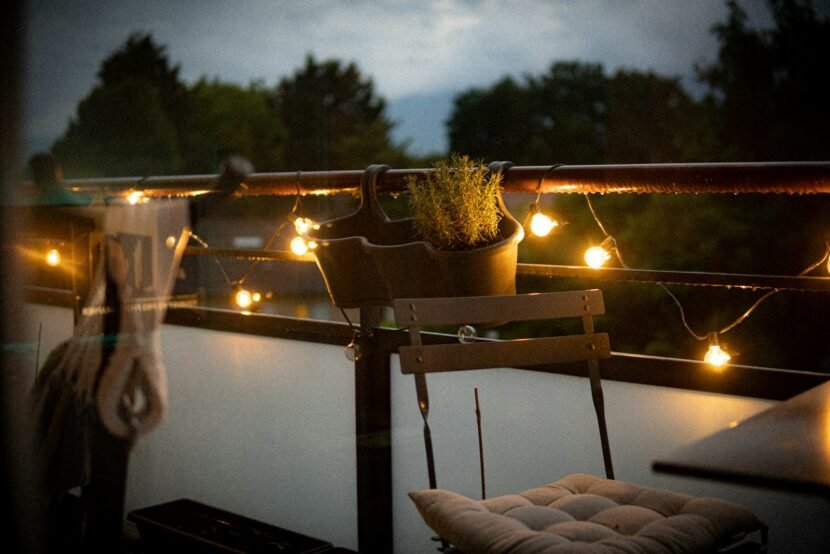 Small balcony with a chair and potted plant