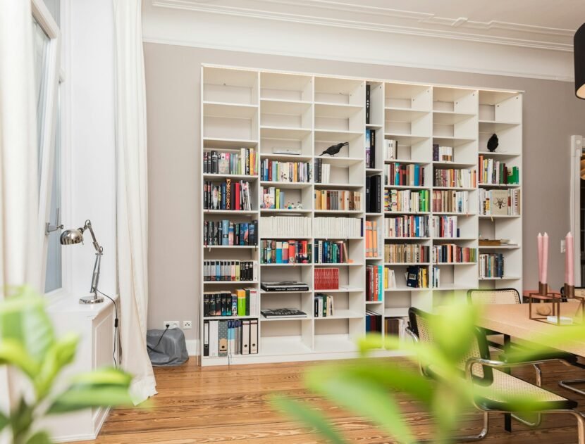 White cube shelving unit used as room storage