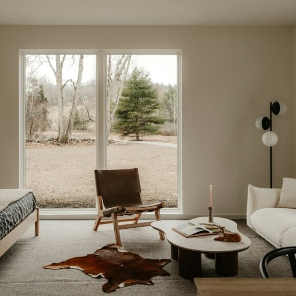 Studio Apartment Ideas That Live Large in Small Square Footage Bright studio apartment with sleeping and living areas sharing one open room