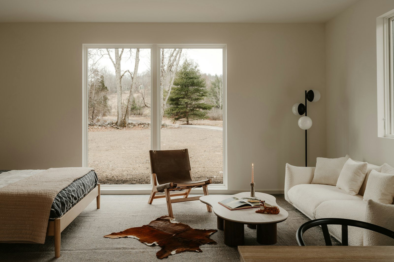 Bright studio apartment with sleeping and living areas sharing one open room