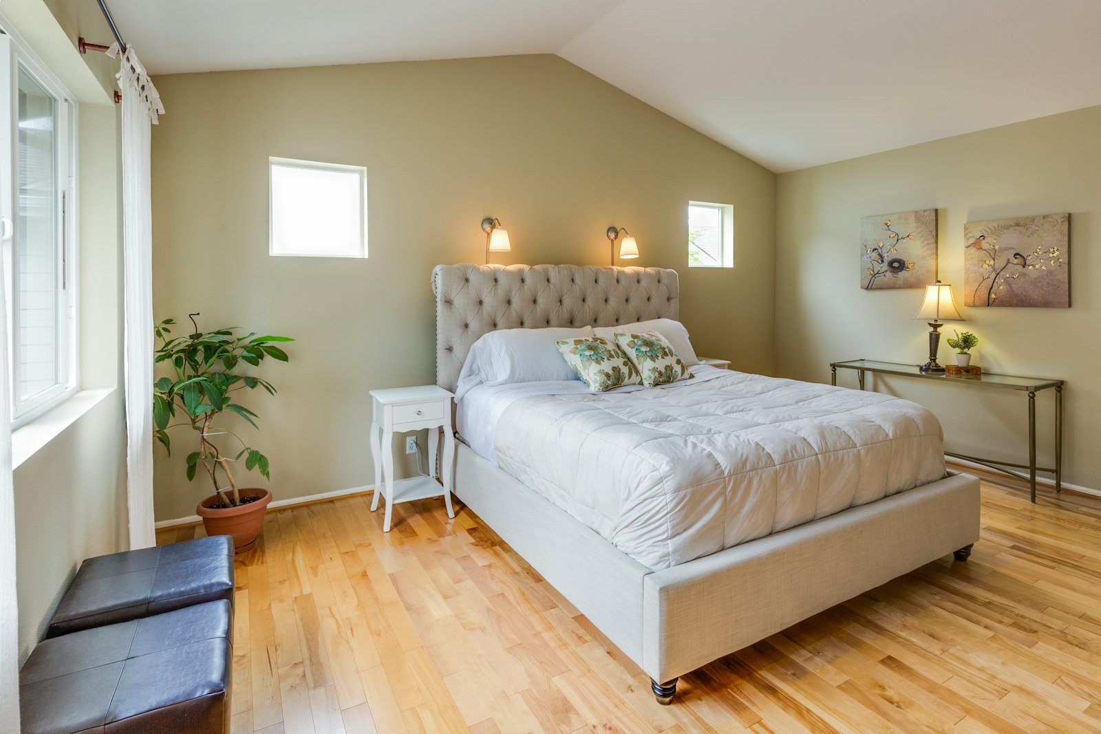 Tufted upholstered bed that hides built in drawer storage underneath